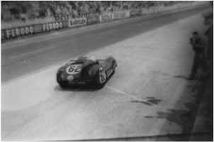 . . . and tears out of the pits for the finish.