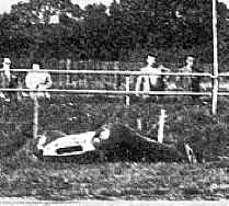 In a ditch after a dice with Ashdown, Silverstone 1956.