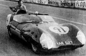 Roger Masson pushing his car four miles to the pits.